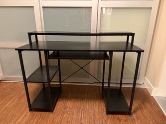 Desk with shelves and monitor stand