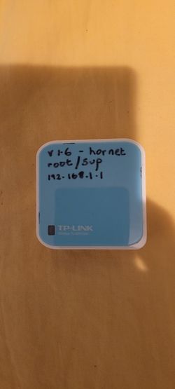 TP Link WR 703N Portable Compact Router