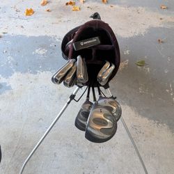Variety Of Golf Clubs And Bag