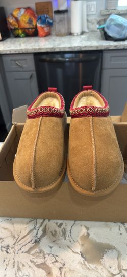 Tan suede embroidered slippers