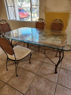 Glass table with 6 chairs