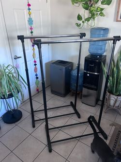 Two aluminum coat racks