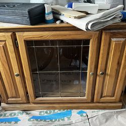 Wooden Tv Stand With Pull Out Drawers And Glass Cabinet