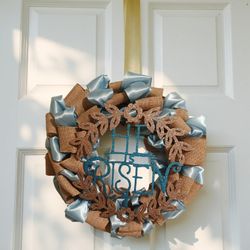 Handmade floral wreath with He Is Risen Sign