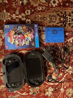 PS ViTA with game and case