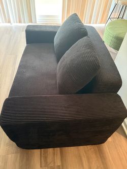 Black velvet sofa