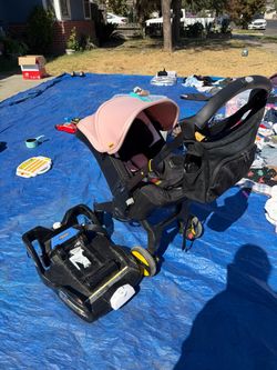 Doona Infant Car Seat Stroller with Base