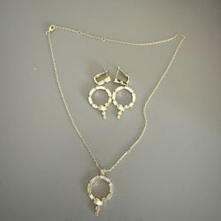 Women’s gold and white jewelry set