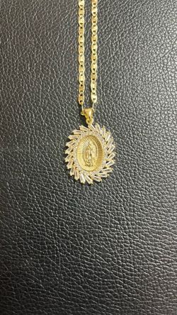 Gold plated Guadeloupe pendant with chain.