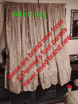 Brand new lace curtains / four panels