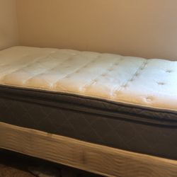 Ashley pillow top twin mattress, box spring, and rails