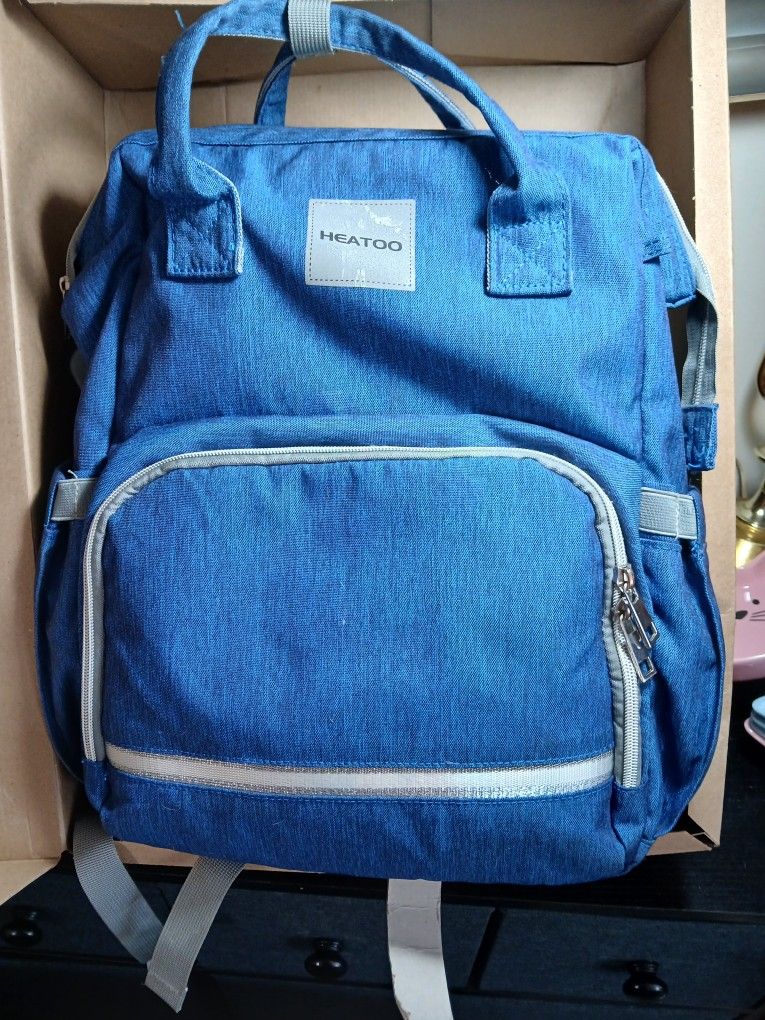
Heatoo Backpack Diaper Bag


This Heatoo backpack diaper bag is perfect for parents who want a stylish and functional accessory for their baby. The b