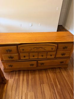 Dresser and attached mirror sold as is