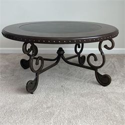 Joniedell Round Cocktail Table with Steel Base by Ashley Furniture