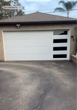 Garage door with Motor like new 15x7