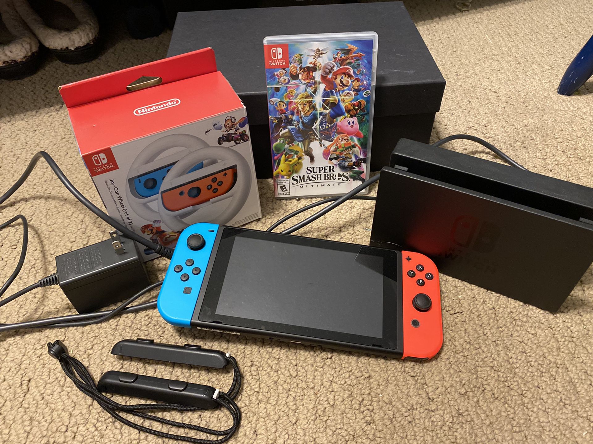 Nintendo Switch Bundle with SUPER SMASH BROTHERS GAME & JOY CON WHEELS