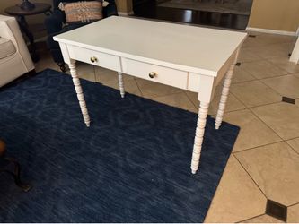White wooden desk with drawers