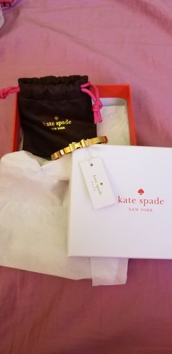 Kate Spade gold bangle with bow authentic