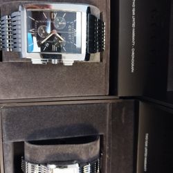 2 Gucci Watches