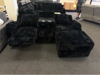 Sectional with chaise and power recliner and storage