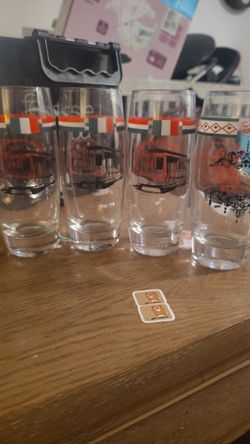 4 Tall Drinking Glasses featuring the old spaghetti Factory.