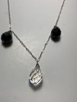 Silver necklace with sparkly crystal drops