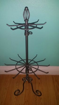 Large jewelry holder....it can hold a ton of necklaces , bracelets, and earrings!!..Also spins..great for someone selling get jewelry!