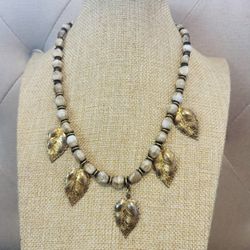 LEAF METAL SEED NECKLACE  $15.00