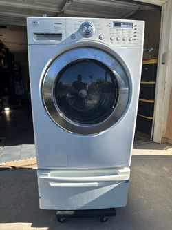 LG TROMM Front-Load Washer with Matching Pedestal – $100