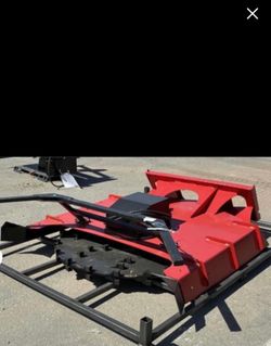 Skid steer mulcher attachment