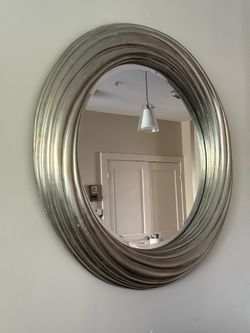 Heavy gold trimmed mirror