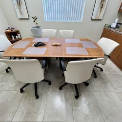 Executive board room conference table and leather chairs