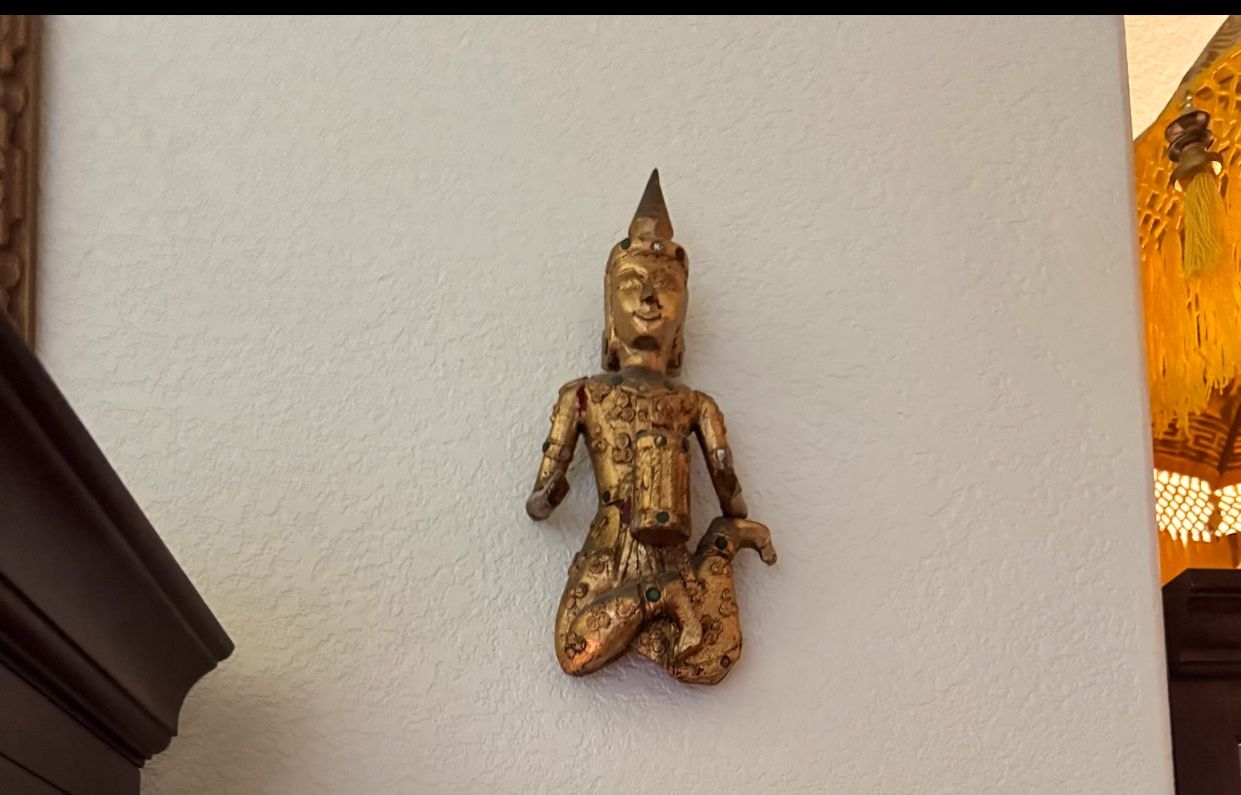 hand-painted, gilded wood kneeling statue, possibly depicting a Teppanom guardian angel or a similar figure from Buddhist or Thai mythology.