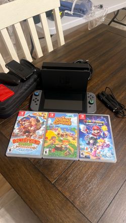 Nintendo switch System. Complete Works perfectly. With Case and 3 games. $290.00