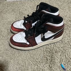 Older Pair Of Jordan 1 Mid 
