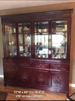 Large solid rosewood cabinet. China Hutch Handcarved in Hong Kong before 1974 takeover.