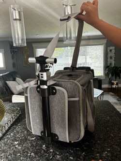 Pet carrier with wheels