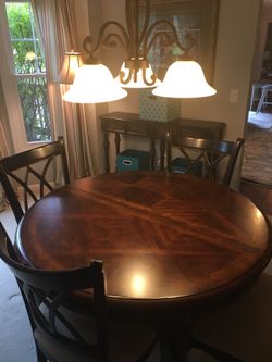 Dining Room Table and Four Chairs with an additional leaf