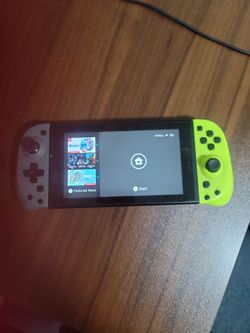 Nintendo Switch with Gray and Neon Yellow Joy-Cons