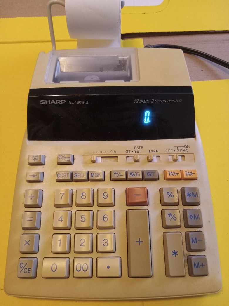 Sharp Adding Machine.
