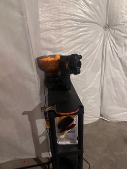 Automati ball throwing machine