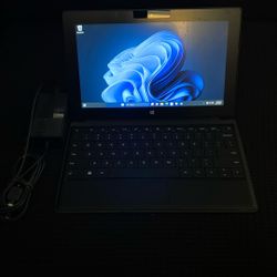 Surface Pro with keyboard and power supply