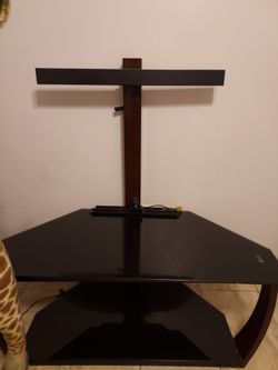 Black entertainment center with TV mount