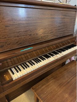 Classic upright piano with bench