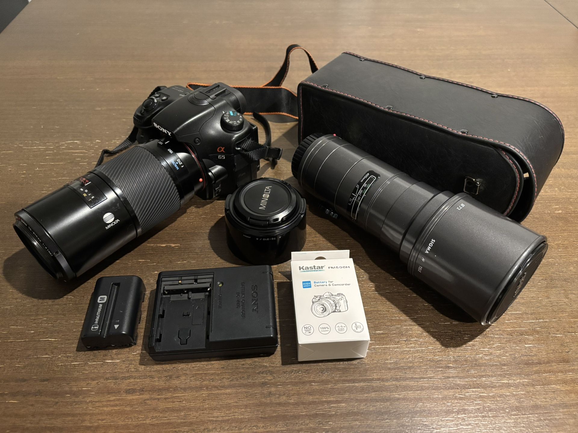 Sony Alpha SLT-A65V 24MP Digital SLT Camera,3 Batteries,4 Lenses (Minolta,Sigma)