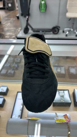 Fenty Puma Black and Gold Sneaker