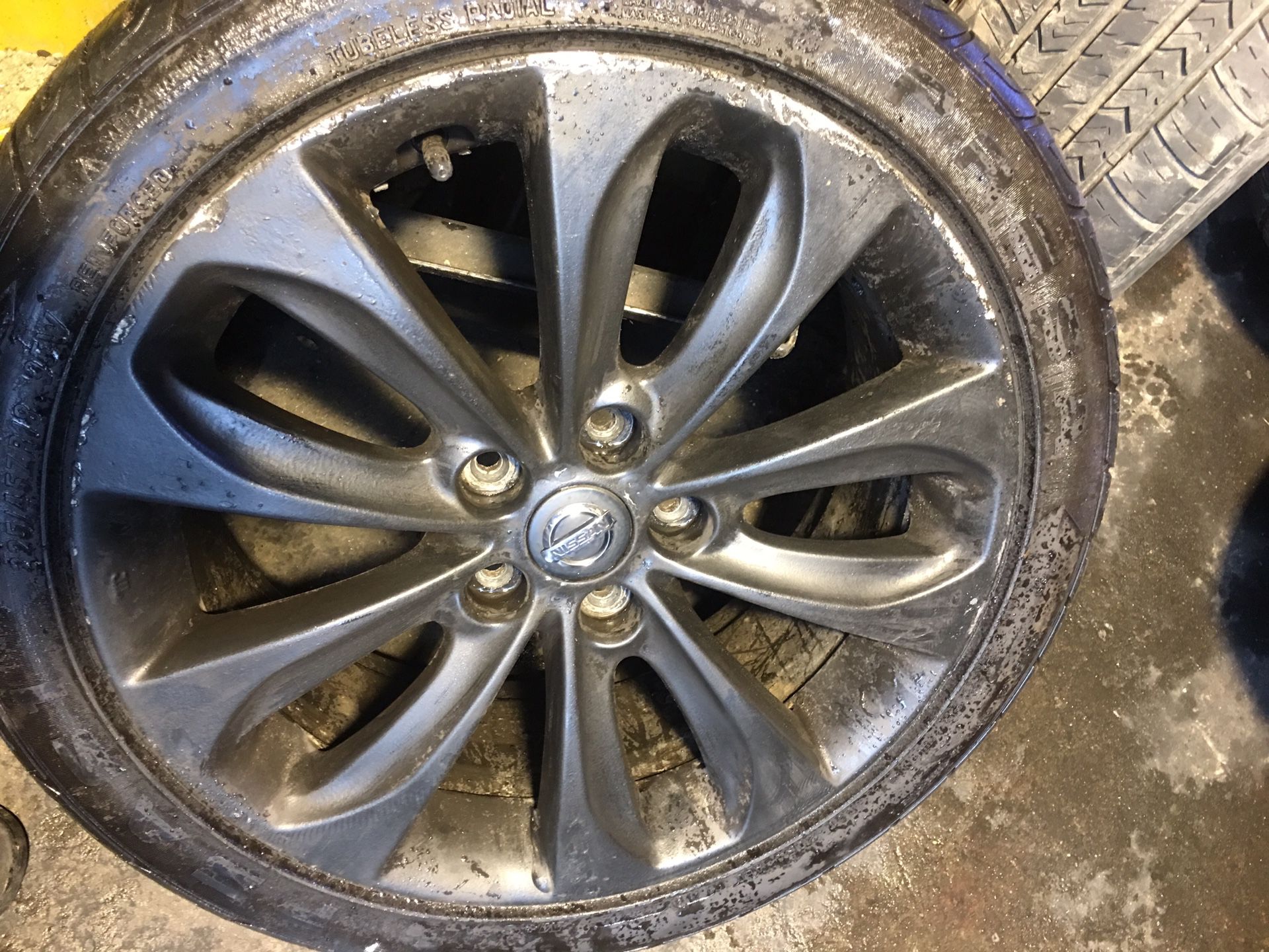 4-Nissan rims and tires 18”