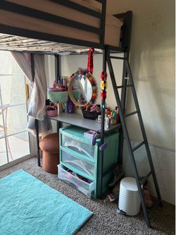 Bunk bed with desk on bottom