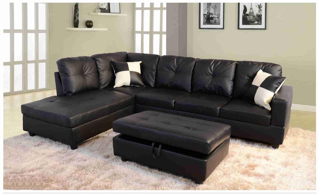 Black faux leather sectional with ottoman & 2 pillows ( new)