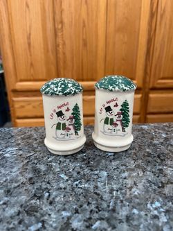 Vintage Christmas “Let It Snow” Salt & Pepper Shakers.  Preowned never used.  Size appropriately 3 1/2 inches tall.